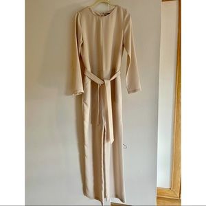 Classic Jumpsuit - Ecru color. Zippered up back.